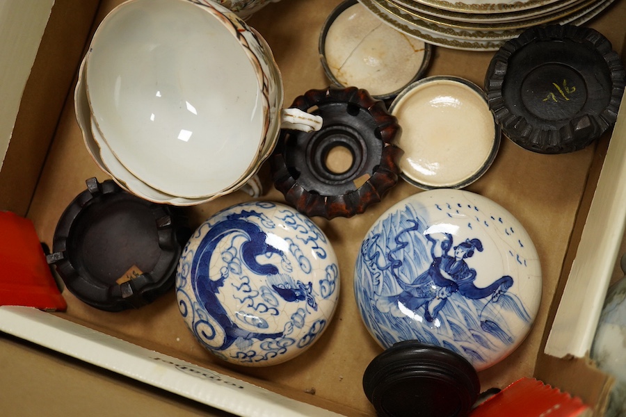 A Japanese eggshell tea and coffee set and three Chinese blue and white seal paste boxes and covers